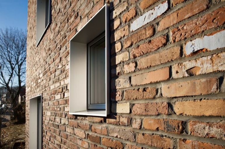 Recycled Bricks Combined with Modern Windows