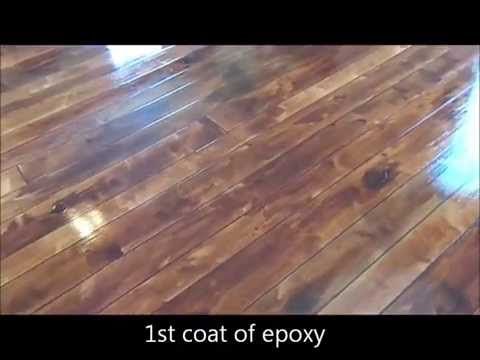 Concrete stained and scored to look like hardwood flooring