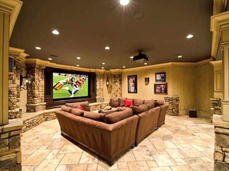 A very large television for watching sports in your man cave